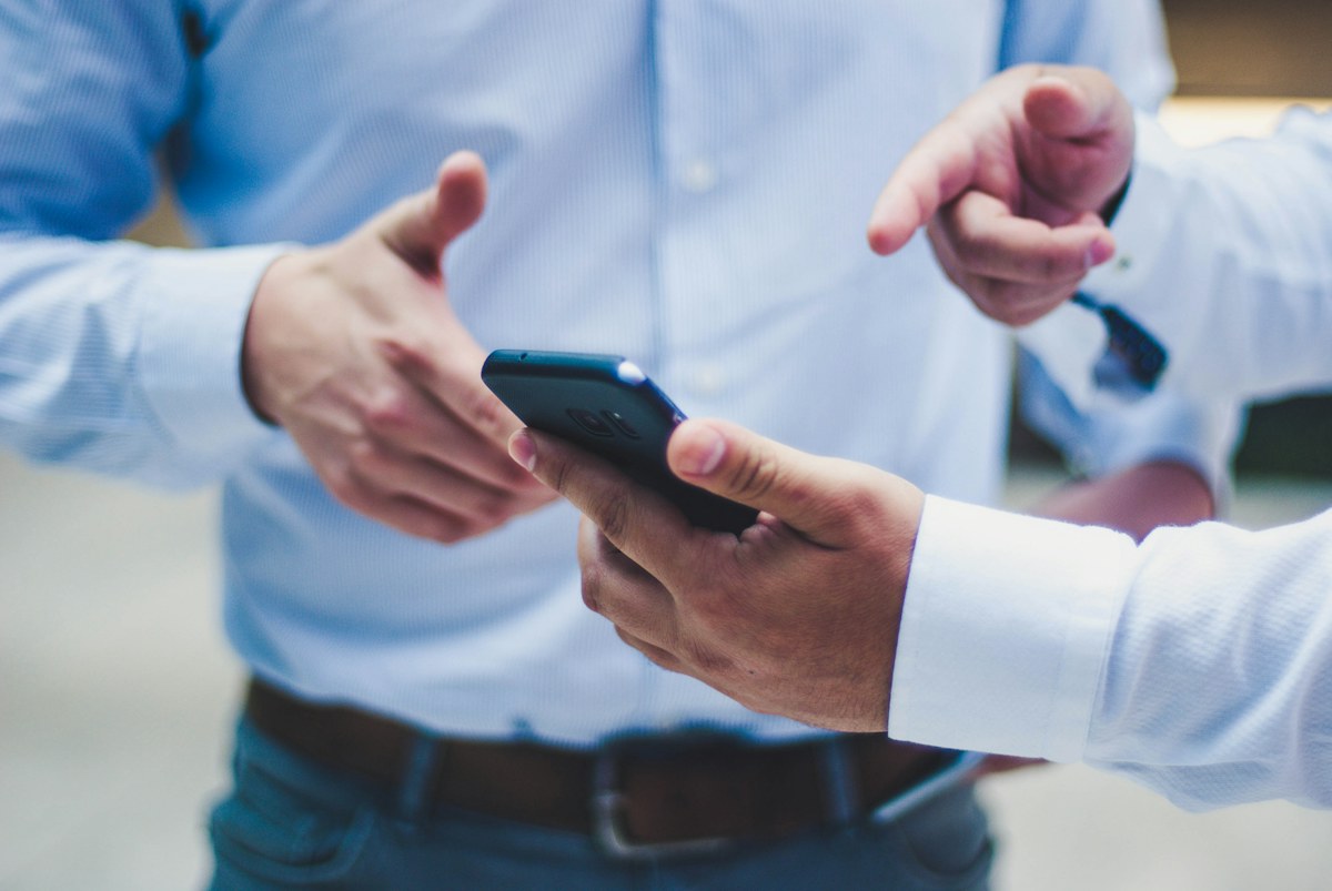 Two businesspeople discussing an agreement
